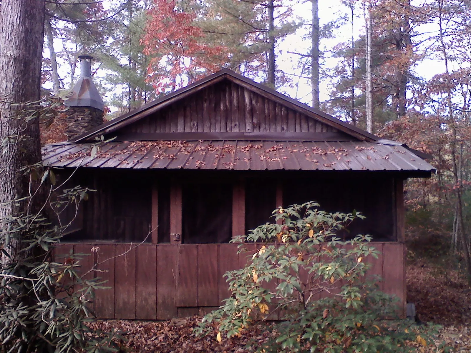 Metal roof over the screened porch of a rustic cabin in Port Hueneme Cbc Base